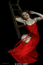Girl in red dress by Anthony Massart 
